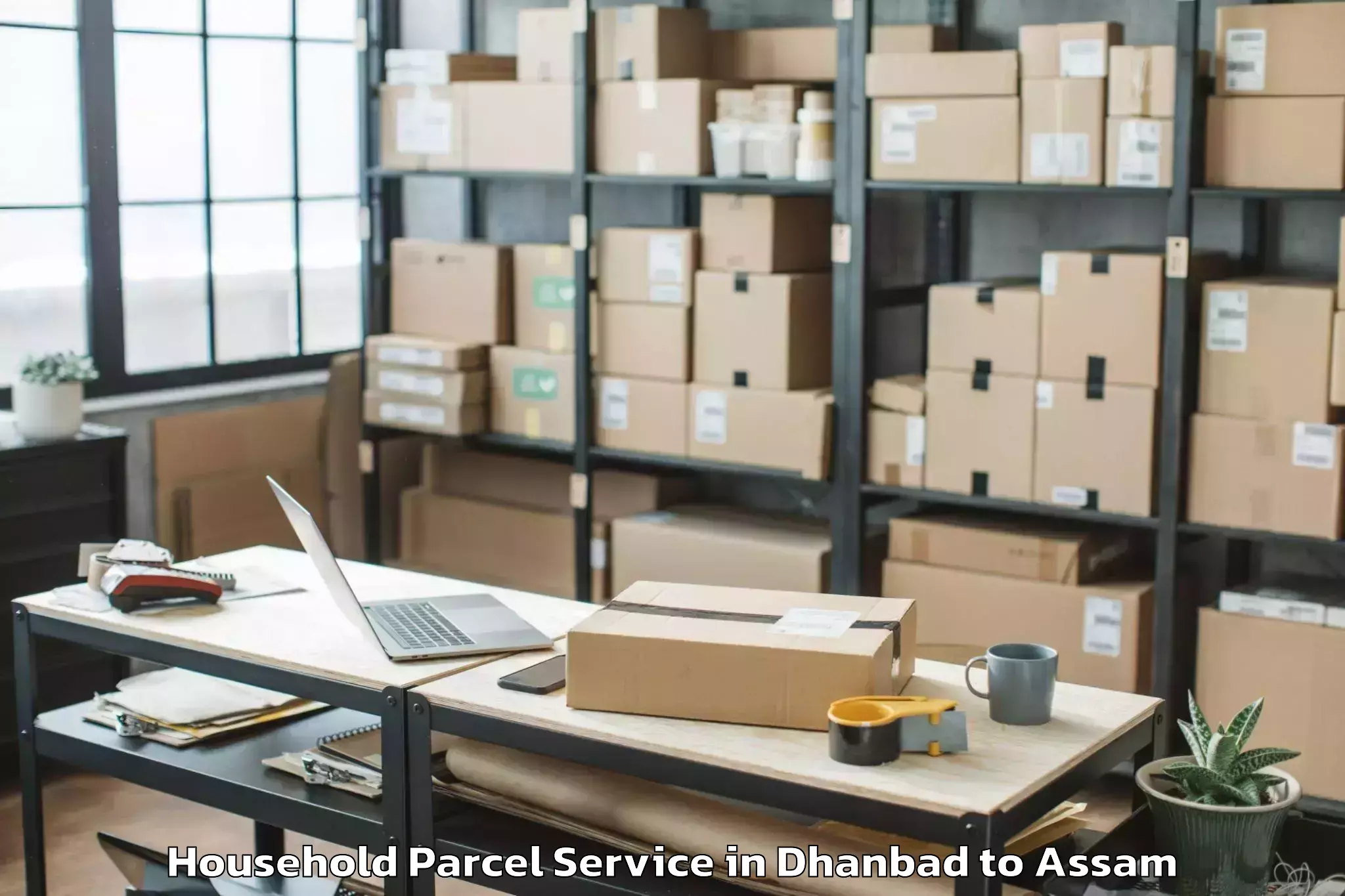 Book Dhanbad to Moranhat Town Household Parcel